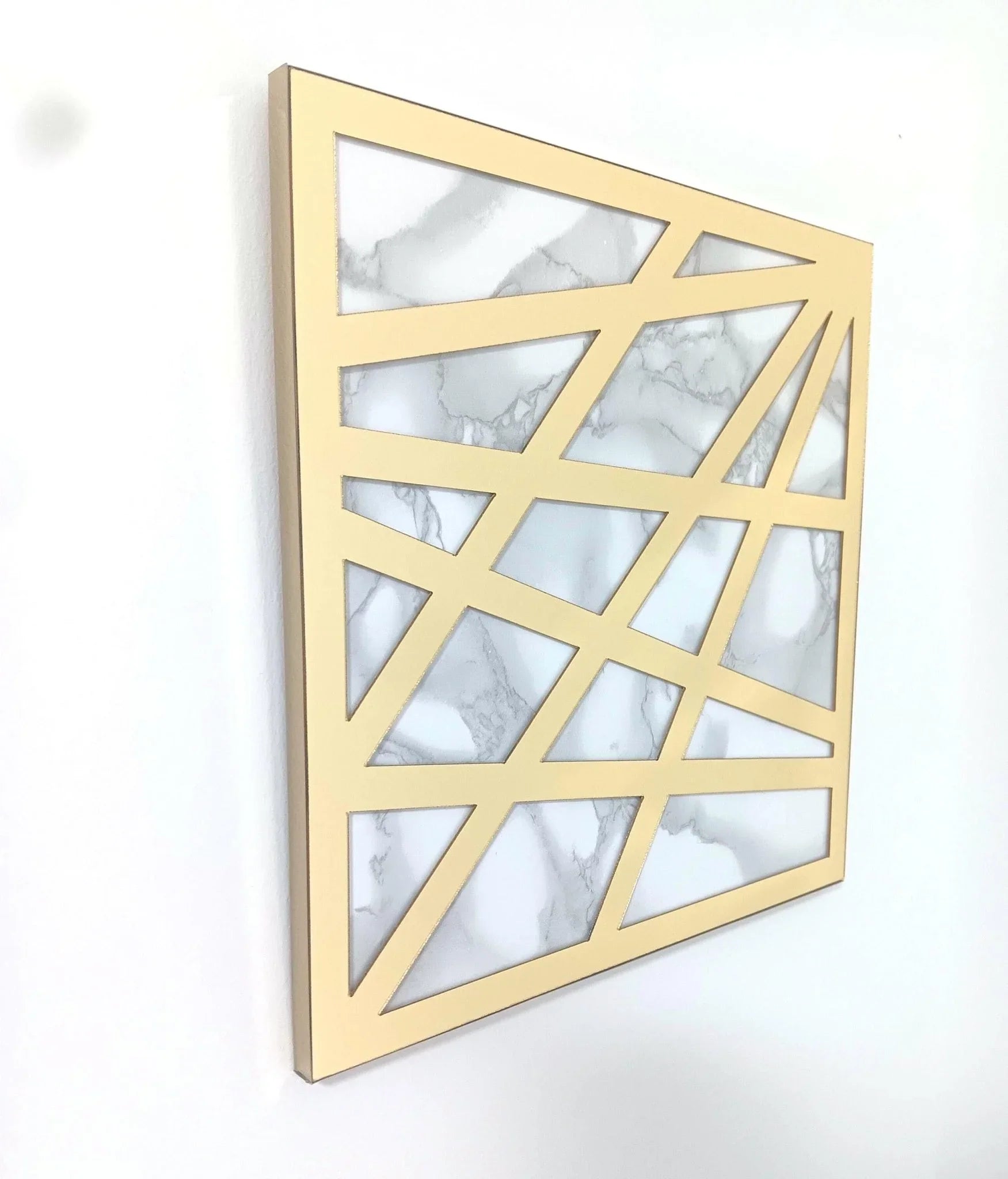 Tableau carré mural 27x27cm effet marbre blanc avec cadre doré moderne et motifs géométriques